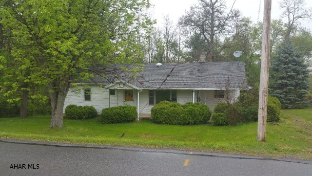 Eldorado area 1 story on nice .42 acre lot.  Large living room with newer carpeting, nice sized eat-in kitchen, 3 bedrooms, full bath and den all on first floor. Hardwood floors, new roof 2011, upgraded 200 amp breakers, attic w/ permanent stairs for storage.