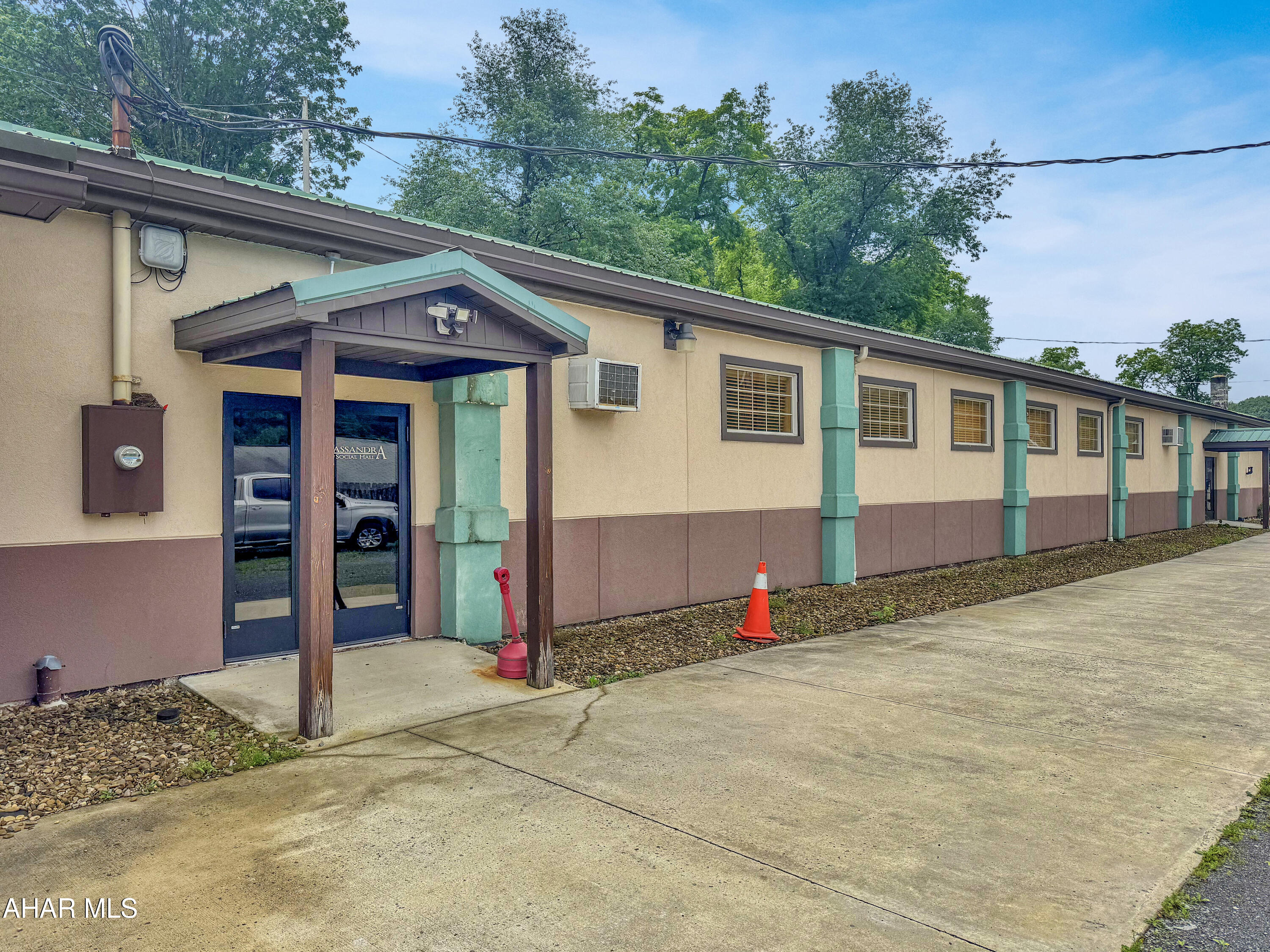 Explore an exceptional opportunity to lease approximately 6,000 square feet of versatile space! Conveniently located at the back of the Cassandra Fire Department, this expansive area was previously utilized as the 'Social Hall' & banquet center. The unit boasts a commercial-grade kitchen, separate men's & ladies' restrooms, three-phase electrical service, & ample open space, making it ideal for a variety of businesses. Whether you're considering a daycare, manufacturing facility, industrial operation, or data center, this space can cater to your needs. Additionally, enjoy abundant parking options w/ over 7 acres available. Don't miss out on this fantastic opportunity, call today for more information!