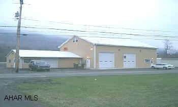 COMMERCIAL BUILDING CALL LISTING AGENT FOR INFO! COMMERCIAL GARAGE ON RT. 220.