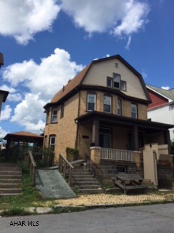 This solid brick offers newer windows, 100 amp breakers, copper plumbing and off street parking. Ready for the investor to flip or duplex. Being sold AS IS.