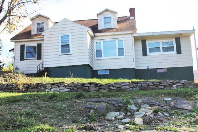 Has 2.5+ acres, all yard ornaments stay, 16x 32 inground pool. large garage. gas forced air heat, laundry room has own water heater