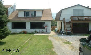 1 year Transferable warranty on new roof 08/05-08/05 Great Starter-Fantastic View of City -Very Large open-Oak Kitchen-1st floor Laundry & 1 car detached Garage w/loft w/heat & electric