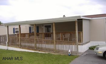 2004 ATLANTIC...2 BEDROOM ...2 BATH... SPECIALLY BUILT WITH .EXTRA WIDE DOOR WAYS...OIL FURANCE.....CENTRAL AIR... ALL APPLIANCES INCLUDED... COVERD PORCH WITH RAMP....SHED.....LOT RENT  $180 INCLUDED TRASH...