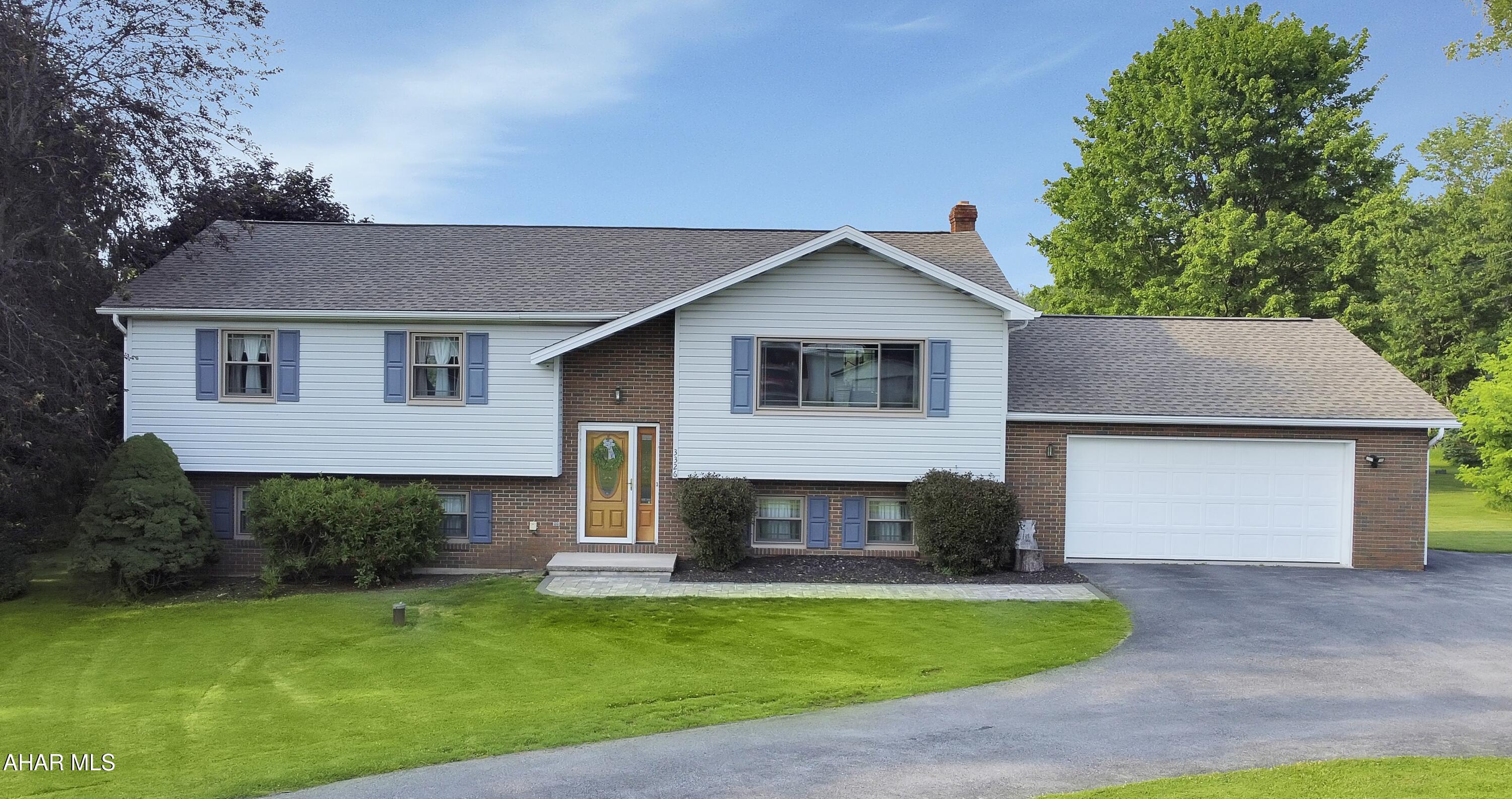 Welcome to 3326 Ben Franklin Highway, located in the Blacklick Valley School District. This stunning home sitting on approximately 1.1 acres, built in 1992, boasts numerous updates including a new roof, windows, & doors, along w/ many other exceptional features. Upon entering the main floor, you are greeted by a spacious living area filled w/ natural light, a cozy dining room, & an expansive kitchen complete w/ included appliances. This level also includes a full bathroom, two well-appointed bedrooms, & a master suite featuring a full en-suite bathroom & private access to the rear deck. Upstairs, you will find all-new laminate flooring that adds a modern touch throughout. The fully finished basement offers a generous living area complete w/ a wood burner, a full bathroom, two additional bedrooms, & laundry. The exterior of the property is equally impressive, featuring a large driveway, a two-car attached garage, & a one-car detached garage. Situated on approximately 1.1 acres, you can enjoy serene privacy, a beautifully customized rear paver patio w/ a fire pit, & so much more! Call today to schedule your showing!