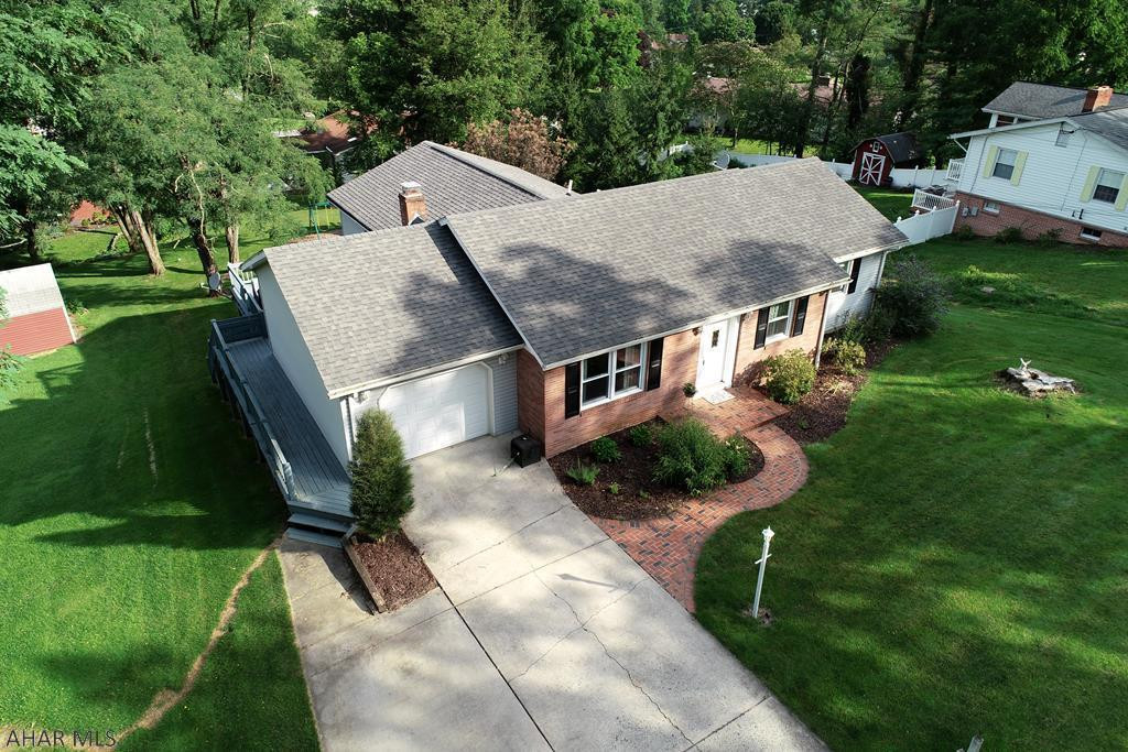 Location, location, location!  This quaint yet spacious home is tucked away in the convenient neighborhood of Meadowbrook Terrace within walking distance to Bedford Middle and High Schools.  The floor plan offers and open layout allowing the homeowner to prepare a tasty meal while visiting with family or guests.  The kitchen has been tastefully updated with granite countertops.  The family room opens onto a large deck for enjoying family time while the kids play in the spacious yard, or solitude while sipping a cup of coffee or curling up with a good book.  To finish out the main floor, there are 3 bedrooms sharing a full bath with double sinks.  For an added bonus, this home has a large bedroom in the basement with a walk-in closet and en-suite bath, as well as a large rec room.