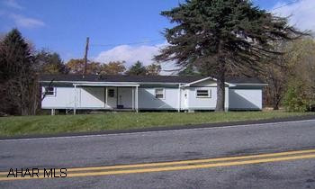 mobile home and garage on almost 2 acres tax ID #'s 06-111-129.3, 43-20-201,205,203,200
