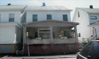 Remodeled eat-in kitchen, all rooms painted w/ new carpet, fresh,  clean, ready to move into, very large rooms, off street parking in rear, fenced yard. 4 bedrooms with lots of closet space, all new flooring, carpet and has all good mechanics.  Utility room,1/2 bath on first floor,Very Large Rooms. All New Oak Kitchen.  Agent owned, Pictures of new Kitchen. Fenced In Yard. Parking in Back.