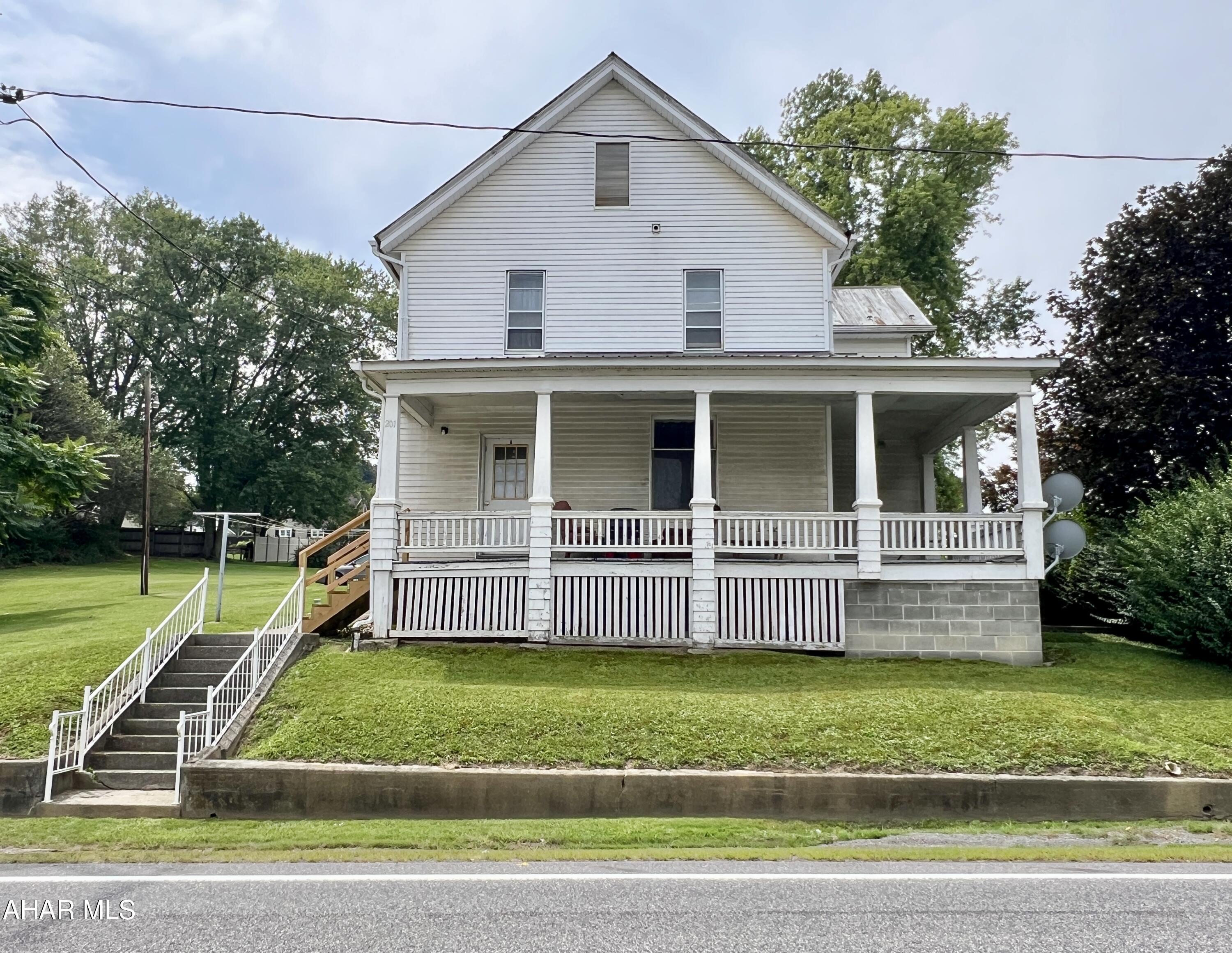 Looking for an investment property with room to grow? This property features three one-bedroom units, providing excellent rental income potential. It includes a private paved parking area and a spacious yard, all situated on a half-acre lot. Conveniently located just outside of town, it's an ideal opportunity for investors seeking income and expansion possibilities. Don't miss out on this versatile property!