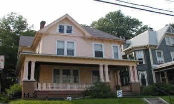 Large victorian home.  Needs TLC.  New Gas Hot water furnace.  All appliances stay.  Chandeliers reserved.  Ornate foyer, fireplace, hardwood floors.