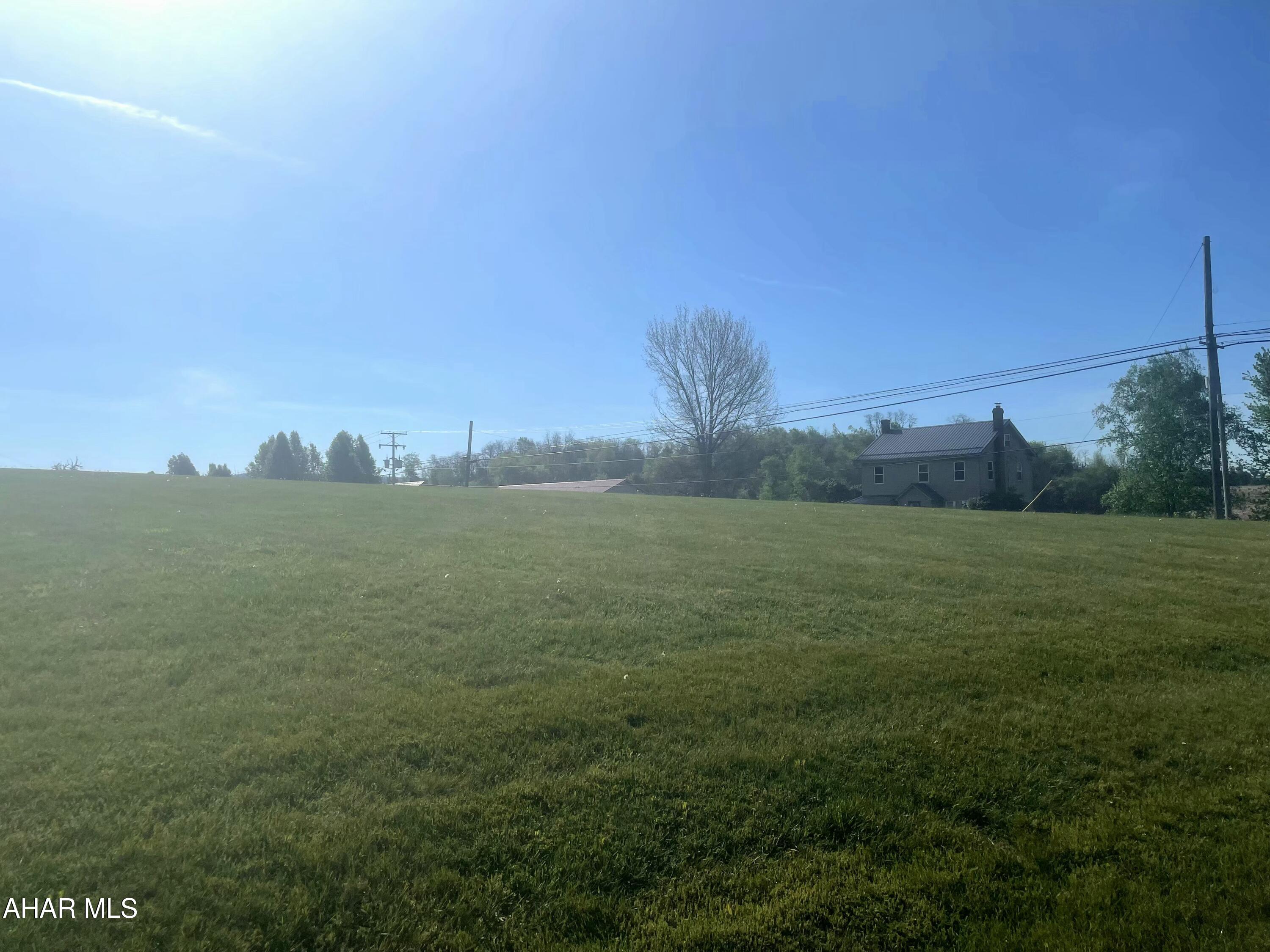 Situated on 2.52 acres this piece of property has endless potential and is waiting for you! Located within walking distance to Morrisons Cove Memorial Park as an added convenience.  

Option to hook on to public water and sewer at buyers expense.