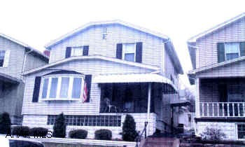 Beautiful maintenance free home with central ac, new windows, sunroom, 1.75 baths, finished basement with fireplace, 2 car garage, kitchen with breakfast nook, carpeting throughout.  Just move in.