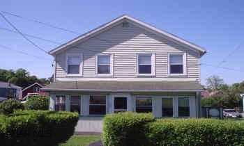 GREAT DUPLEX SPACIOUS 4 BEDROOM PLUS SMALL EFFECIENCY, ENCLOSED SUNPORCH, NICE YARD CALL CATHLEEN TUBO TO SET UP SHOWINGS    Property Purchase Contingency
