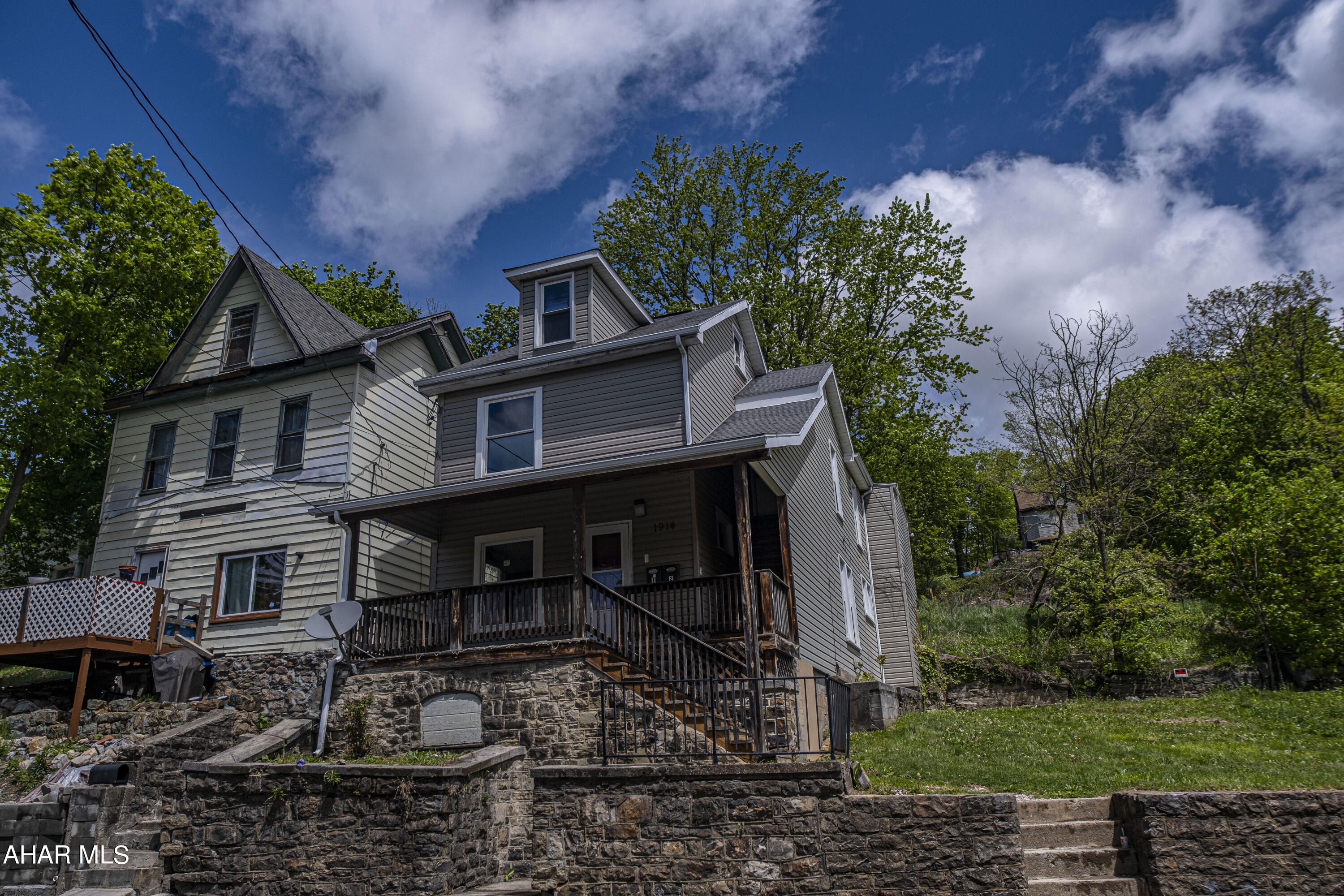 Calling all investors. Great opportunity for a multi unit. Separate utilities. One bedroom and  1 bath on the first floor. Second floor has 2 bedrooms 1 bath.