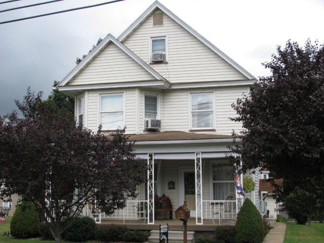 Immaculate 2 1/2 story vinyl sided home in Bellwood, EIK / custom oak cabinets and pantry, 1st floor laundry, LR., DR., 3-4 bedrooms, screened patio, 24x30 2 car garage w/ openers, close to pool and community park
