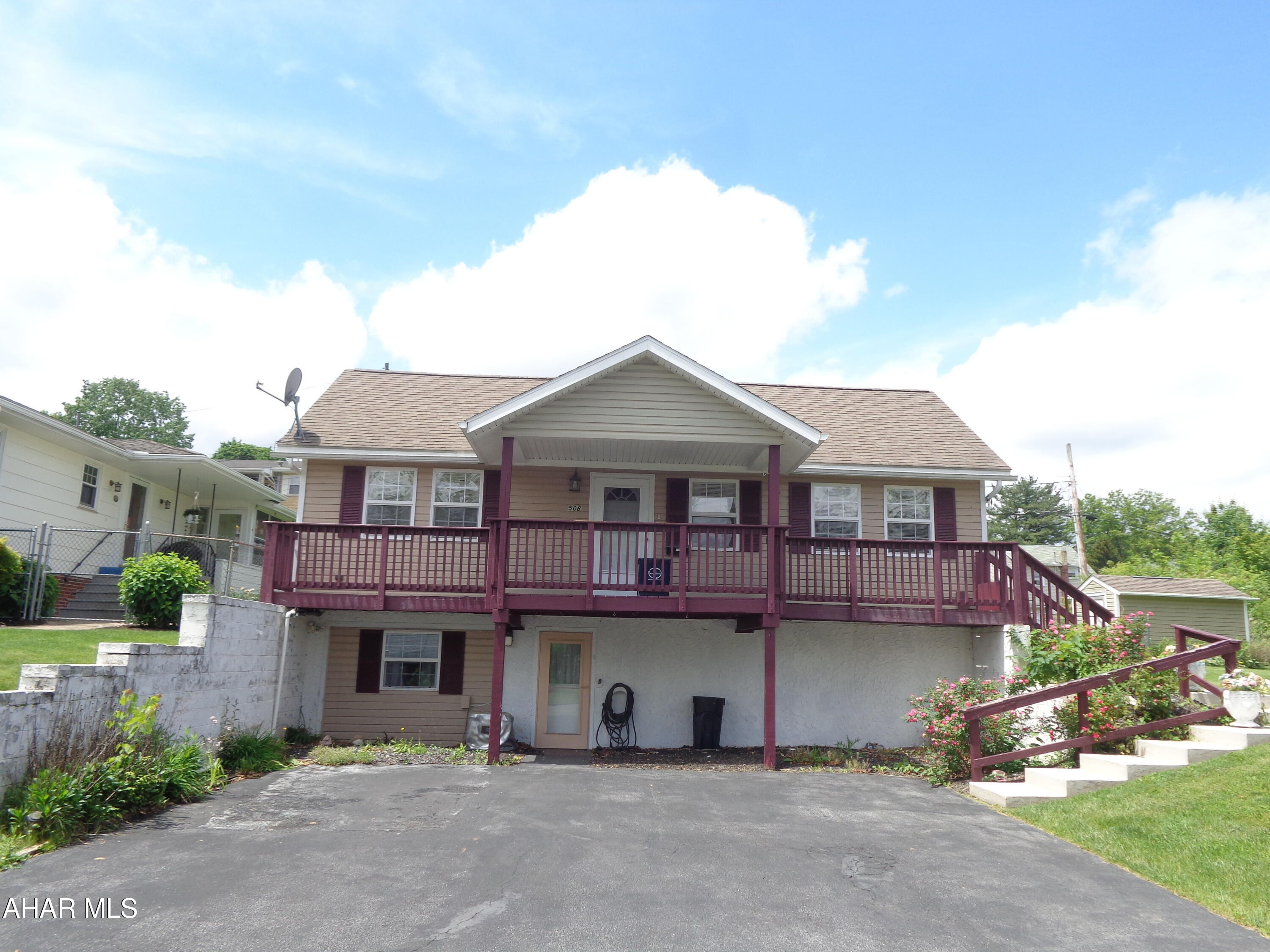 In the heart of a picturesque neighborhood is a cozy, 1 story home on a dead end street.  It has a practical design for function and convenience.  Fenced in backyard on a triple lot.  Family room in basement with a 1/2 bath.  There is also a deck.