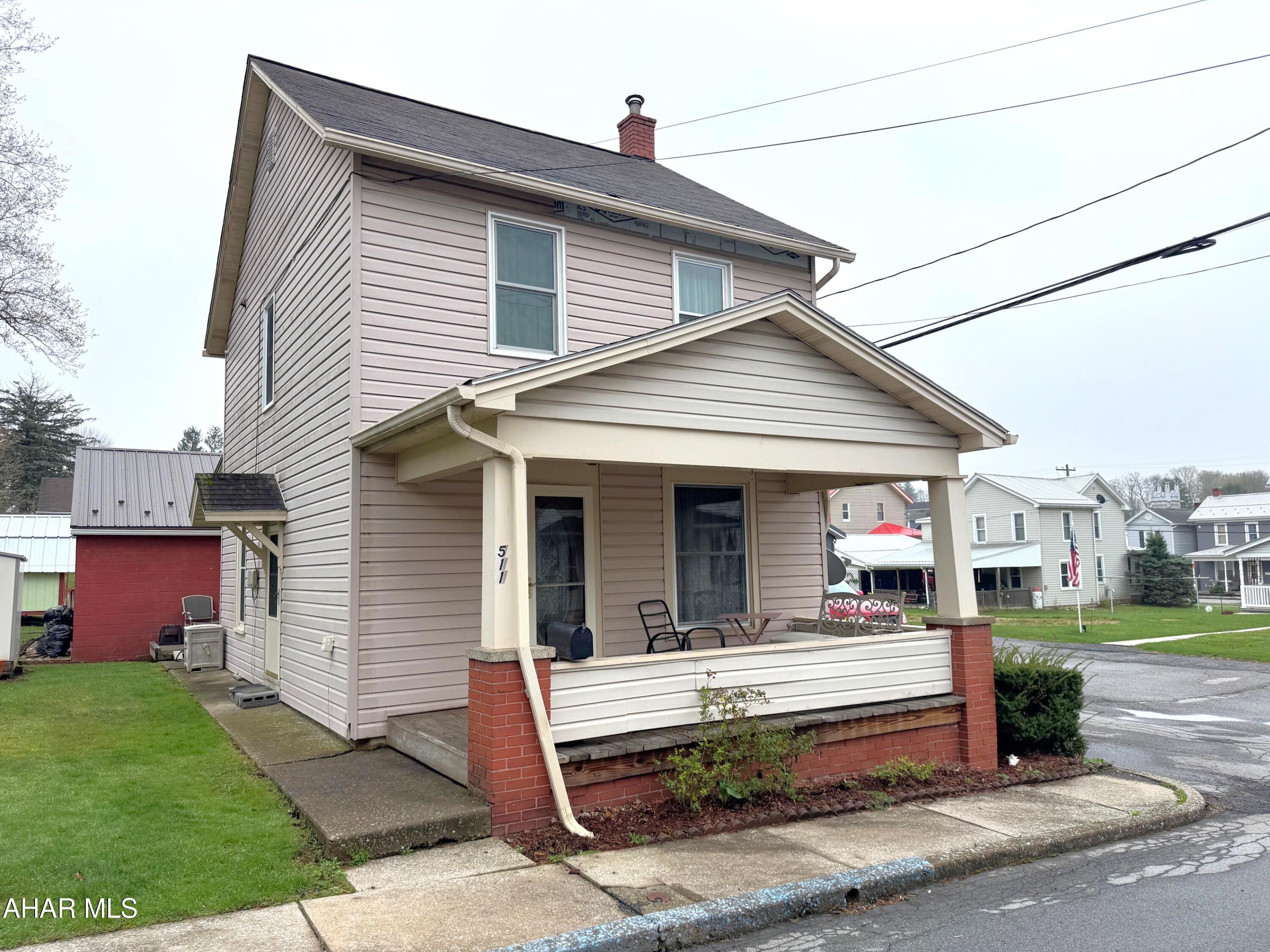 Charming two-story home located in the heart of the Roaring Spring Borough. The main level of this home offers a living room, dining room, and kitchen. The second level has two bedrooms and a full bath. It rests on a full basement and also offers a large walk-up attic for storage. Replacements windows, vinyl siding oil HW heat, 200-ampere electric service, and public water and sewer. Nice level yard with a small shed.