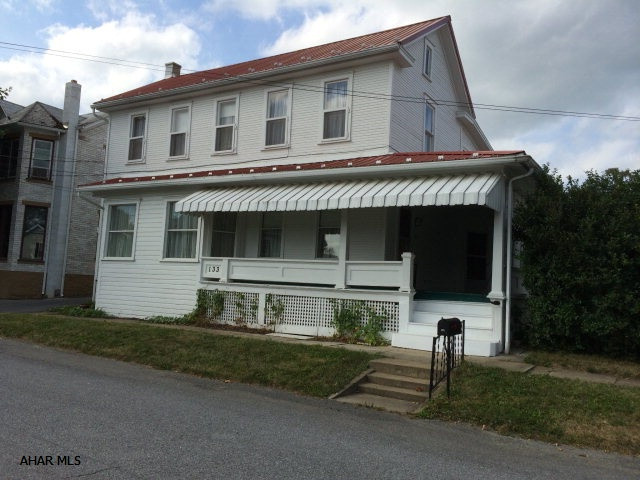 This charming colonial located in a quiet area in the lovely town of schellsburg is MOVE IN READY!  Freshly painted both inside and out, new metal roof and gutters, new baths, fenced yard, well insulated, ceramic tile/laminate/carpet flooring. Feature a 2 car garage with insulated garage.