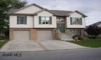 NEWER VINYL BI-LEVEL WITH CUSTOM INTERIOR AND CUSTOM EXTERIOR FEATURES. ELDORADO.  CUSTOM BUILT "ONE-OF-A-KIND" HOUSE.  THIS BUILDER OWNED HOME HAS MANY AMENITIES NOT USUALLY OFFERED, SUCH AS OAK TRIM, UNIQUE FLOOR PLAN, A LARGE FAMILY ROOM OUT TO A PRIVATE PATIO AND FINISHED/HEATED GARAGE.  NOTHING COMPARES TO THIS QUALITY AND ATTENTION TO DETAIL.