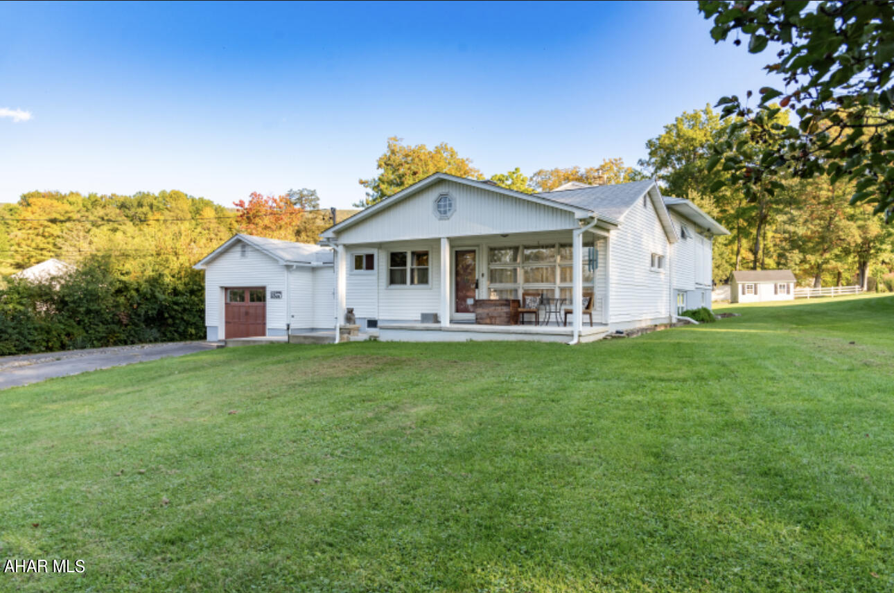 Situated on just over an acre of land, this Bellemeade home provides serenity and space!  This unique multi-level home offers 3 bedrooms and 2.5 bathrooms.  The living room and dining room boast of hardwood floors and an abundance of natural light. The first floor also has a bedroom and full bathroom. Cozy up next to the wood burner in the family room on those cool evenings. 

The large yard is enticing.  Enjoy the peaceful stream that runs through the property, take a seat in gazebo to escape those warm summer days, or cross the bridge to explore the woods.  The outbuilding is now being used as a workshop but utilize it as an area for the kids, a home office or gym, or however you see fit. 

Within the last 5 years the roof, gutters, windows, and sliding glass door have been replaced.  You'll never run out of hot water as a new instant water heater was just installed.