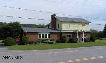 Immaculate two story home.  New roof; first floor laundry room and first floor family room with fireplace.  20x45 garage.  Large deck.  1.6 acres can be residential or commercial.  On Old 220 across from Industrial Park.  Immaculate two story home.  New roof; first floor laundry room and first floor family room with fireplace.  20x45 garage.  Large deck.  1.6 acres can be residential or commercial.  On Old 220 across from Industrial Park.