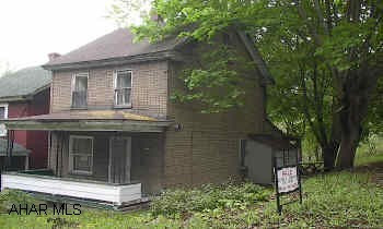 Two  parcels: One 58X120, Two  200X120 Could be a great building site. House is in poor condition. Property to be sold "as is".