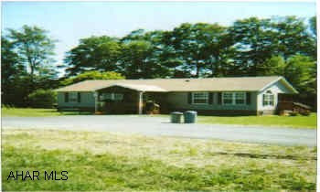 Extra nice double wide  1999 Skyline.  All appliances, deck, fireplace, new porches, brick skirting.  Sunroom, new porches, lot rent $290/mo inlcudes water and sewer.