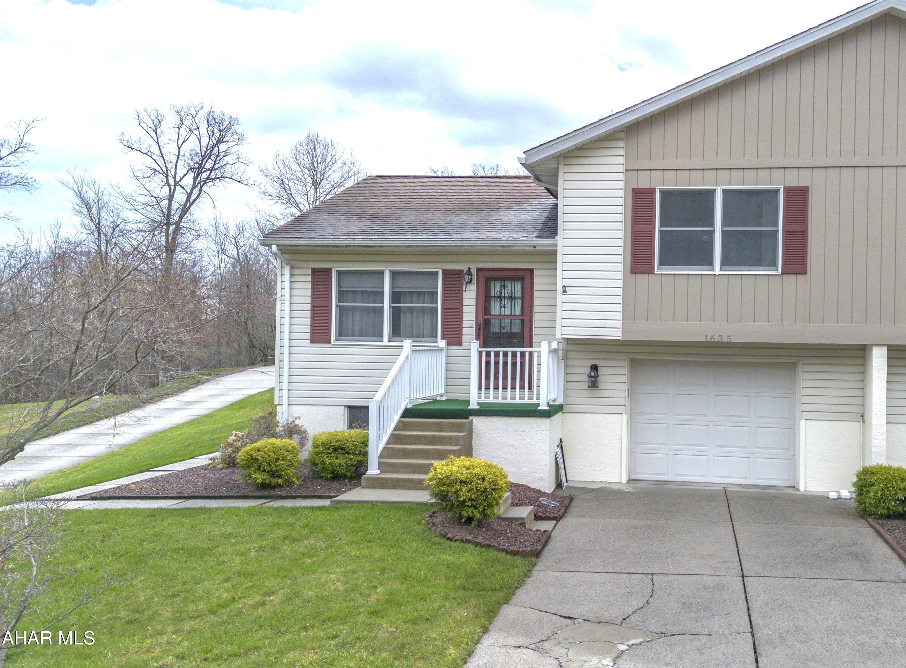Charming and affordable townhome in Eldorado section of Altoona on a dead end street! This well-maintained property features 2 bedrooms with a bonus room in the finished lower level that could serve as a 3rd bedroom. Enjoy 1.5 baths, including a handicap-accessible shower for added convenience. The home also includes a 1-car integral garage, a cozy sunroom, and additional living space in the finished lower level--perfect for relaxing or entertaining.
