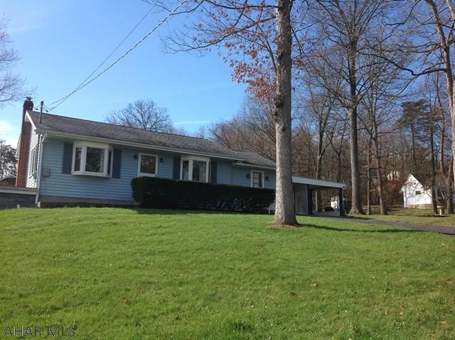 Well built home with efficient natural gas, hot water heat ...Main level 2-car attached carport ; main level family room .  replacement windows including angle-bay window.  Large 2 car garage with 2 OH doors  (  installed 2013 )  annexed to basement level .  Very efficient , Beduras natural gas , hot water furnace & Rinnai tank-less water heater (both installed 10/2011  @ $10,000. )    New 200-amp electric service panel 2008.   Nice home beautifully located ....Seasonal view of the lake.