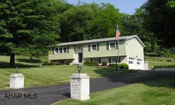 Immaculate Brick / Aluminum Bi-Level in picturesque setting on large corner lot in preferred residential area. Immaculate Brick / Aluminum Bi-Level in picturesque setting on large corner lot in preferred residential area. Finished walk-out basement with family room and workshop. Screened porch, security alarm system, private well for external use, 2-car integral garage, manicured lawn, professional landscaping.