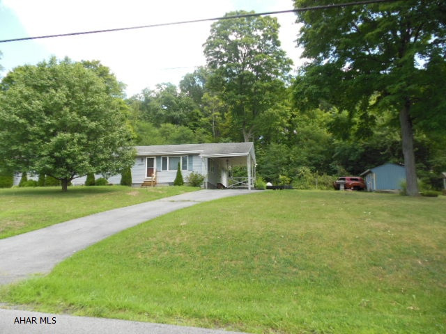 One story with 3BR, 1BA, 2 car attached garage, carport and more on 3/4 of an acre of ground. Vaulted ceiling in dining room, fireplace in basement (wood), appliances, ceiling fans, Burnham boiler with integrated hot water tank. High steps to basement - please watch!  No key yet for the garage, but forthcoming...  (*Agents check private comments.)