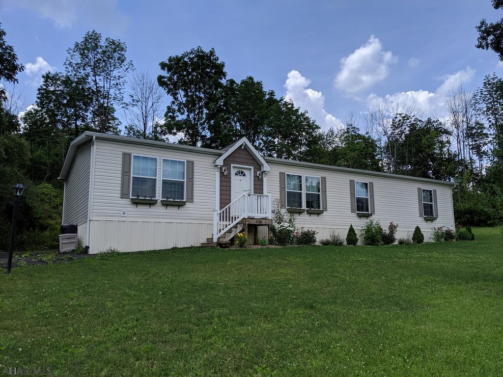 *HOT NEW PRICE* LUXURY mobile home for sale in beautiful Camelot Woods of Greenwood area. Built in 2017 this home has an endless amount of features! Ultimate kitchen has all newer stainless steal appliances, dishwasher never used. Walk-in pantry with so much storage! Pot filler faucet over the stove saves you from lugging a heavy pot of water from the sink to the stove. Tons of cabinet space! Master bedroom has a huge walk-in closet, duel vanity and over sized ceramic tile shower with a seat in the master bath. Every wall has been dry walled! Outdoors you will find annual plants beginning to sprout all around the landscaped property. Enjoy time on the deck, store your things in the vinyl shed, make this your new home!