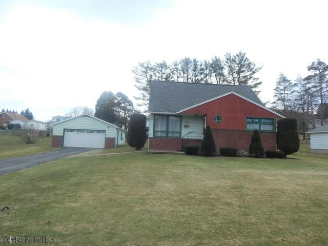 Hurry! Priced to sell MYLO PARK, Ebensburg. 3 BR, 1  bath, garage, generous back yard. Bright, cheery, well maintained home with hardwood floors. Large Basement with great height!.