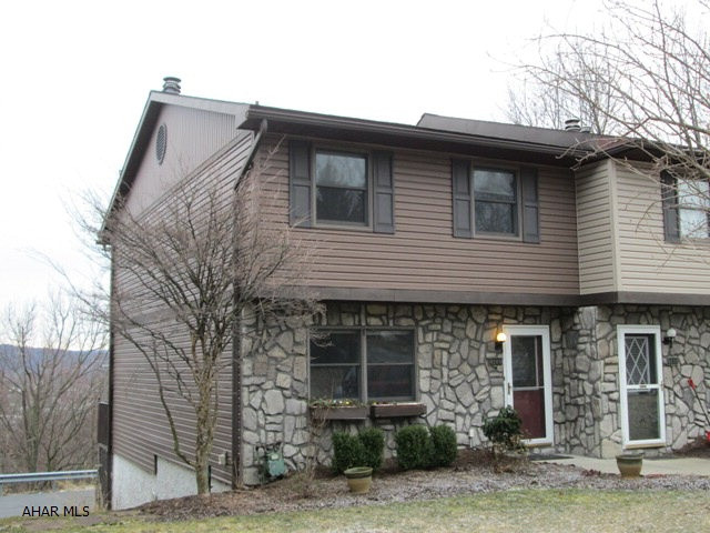 Highland Park area. Rare opportunity for this 3 BR with 2.5 bath townhouse. This spacious end unit features updated kitchen, appliances included, updated full bath and large family room on lower level. Sit in the sunken livingroom and enjoy the breath taking views of the area.