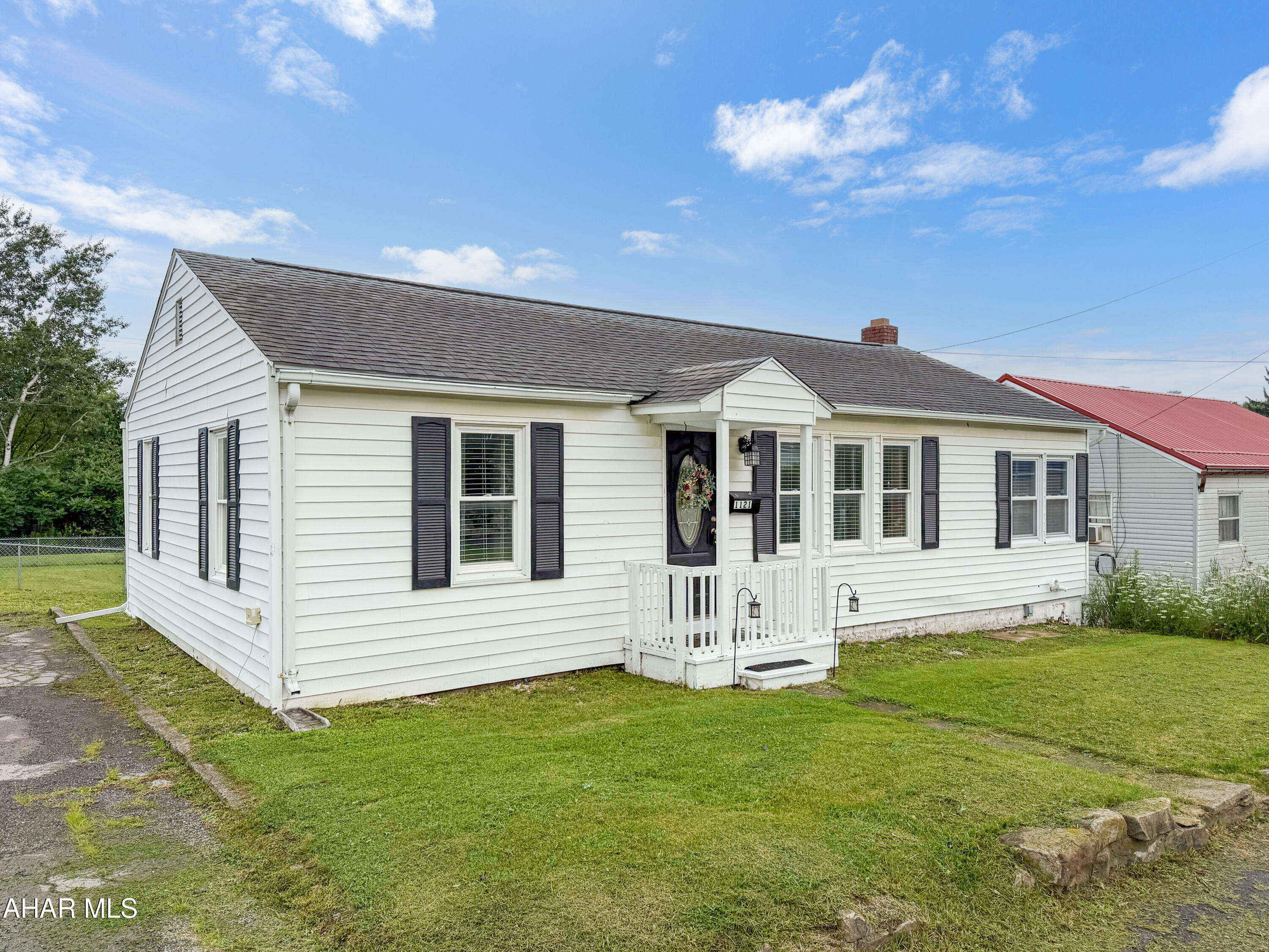 Welcome to 1121 W High Street in the Central Cambria School District! This beautifully updated ranch-style home sits on a spacious, fenced-in lot in Ebensburg, offering the perfect combination of comfort, convenience, and move-in-ready living. The main level features a bright and inviting living room filled with natural light, a formal dining area, an updated kitchen complete with included appliances, three generously sized bedrooms, and a beautifully updated full bathroom. The full basement has been professionally waterproofed and provides abundant storage space, laundry facilities, and room for future finishing if desired. Outside, you'll appreciate the ample off-street parking, large fenced backyard, and covered rear deck. Conveniently located within walking distance to schools, parks, shopping, restaurants, and everything downtown Ebensburg has to offer. Don't miss your opportunity to make this wonderful property your next home. Call today to schedule your private tour!