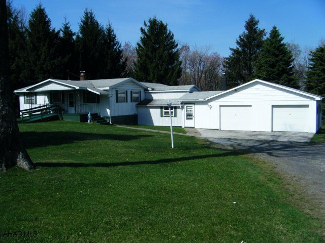 Home has a pretty setting, 2.7 acres, private. Original home was a sectional home, dated 1970. A family room was added along with rear deck with roof, mudroom, garages. Bedrooms are small! Expect to make changes in the floor plan unless you can use small bedrooms.
