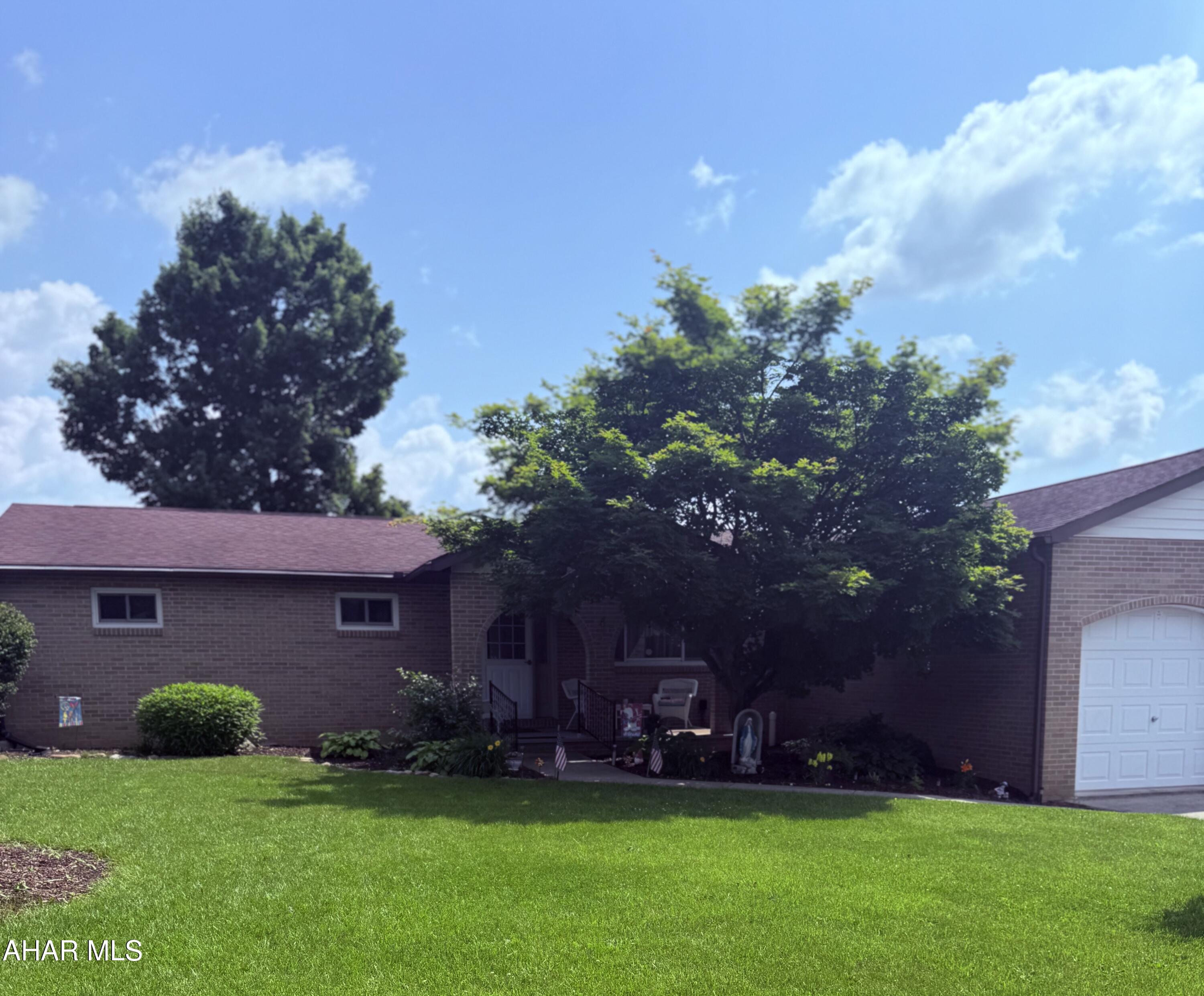 Beautiful well maintained ranch home in Woodland Terrace.  Large spacious eat in kitchen, dining room overlooking the spacious deck for all your entertaining needs.  Three spacious bedrooms with plenty of room and storage,  A oversized garage and covered porches make this home a must see.