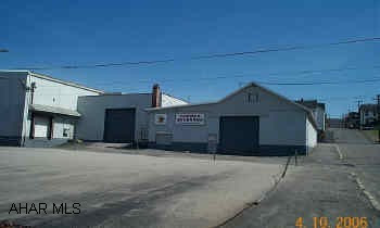 Approx 13,500 total sq ft.  7,000 sqft - Refrigeration Room with 22' Ceiling - 1500 sqft Office Space - Full Parking Block Adjacent  Tax ID#1.8-4-102-68-69-70-71-72.  Bay Doors - Dock Access - Ramp Access Approx 13,500 total sqft.  7,000 sqft - Refrigeration Room with 22' Ceiling - 1500 sqft Office Space - Full Parking Block Adjacent  Tax ID#1.8-4-102-68-69-70-71-72.  Bay Doors - Dock Access - Ramp Access.