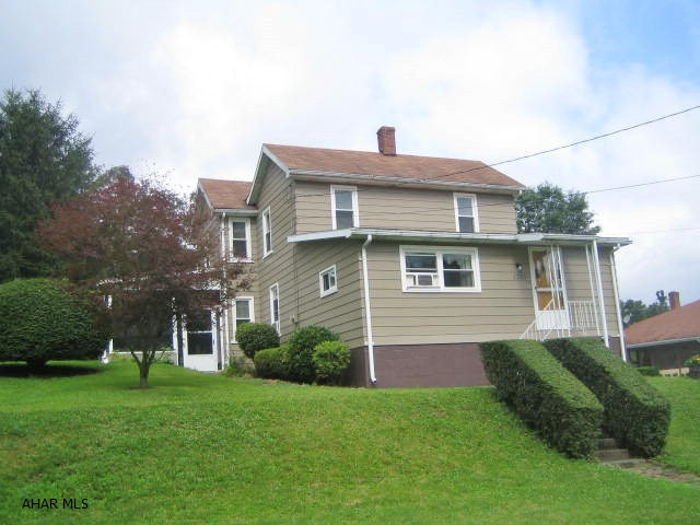 Immaculate 2 story Eldorado home on 1 acre lot. Many updates including beautiful newer kitchen with center island, 2 full baths including newer first floor bath. First floor laundry/mudroom and large family room. Relaxing screened patio plus large covered patio. Huge 2 car detached garage with work shop area, openers  and walk up 2nd floor storage. 1 year home warranty included.