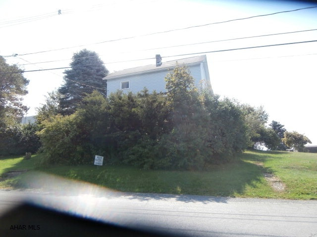 Vinyl sided two story home on a 50x150 lot. Edge of town location this home will make a great starter home. Priced to sell at $24,900!!