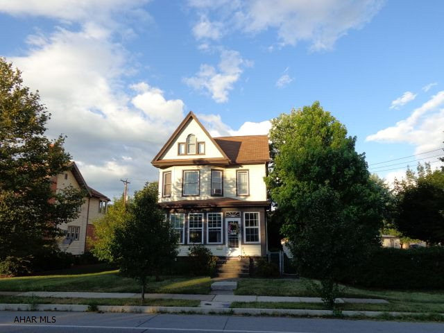 A classic Beauty! This charming home is all that you have been looking for with 5 bedrooms, 2 baths, heated 4 season room, 1st floor laundry and full bath, new windows, deck, shed, lots of storage. Spacious eat-in kitchen with all appliances included. Seller installing new gas furnace soon. Once you see it - you will want to own it!