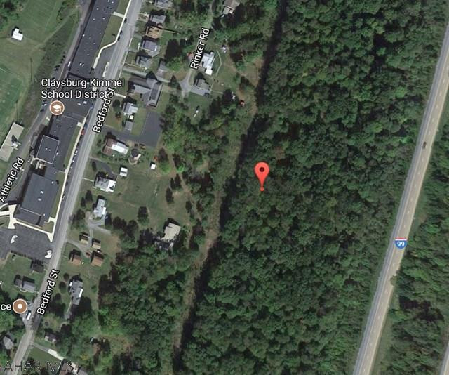 7.82 acres of mostly wooded ground in Claysburg across from the school and bordering I-99. This is a terrific building lot where you can have privacy and still be in town. Call listing agent today for more details.