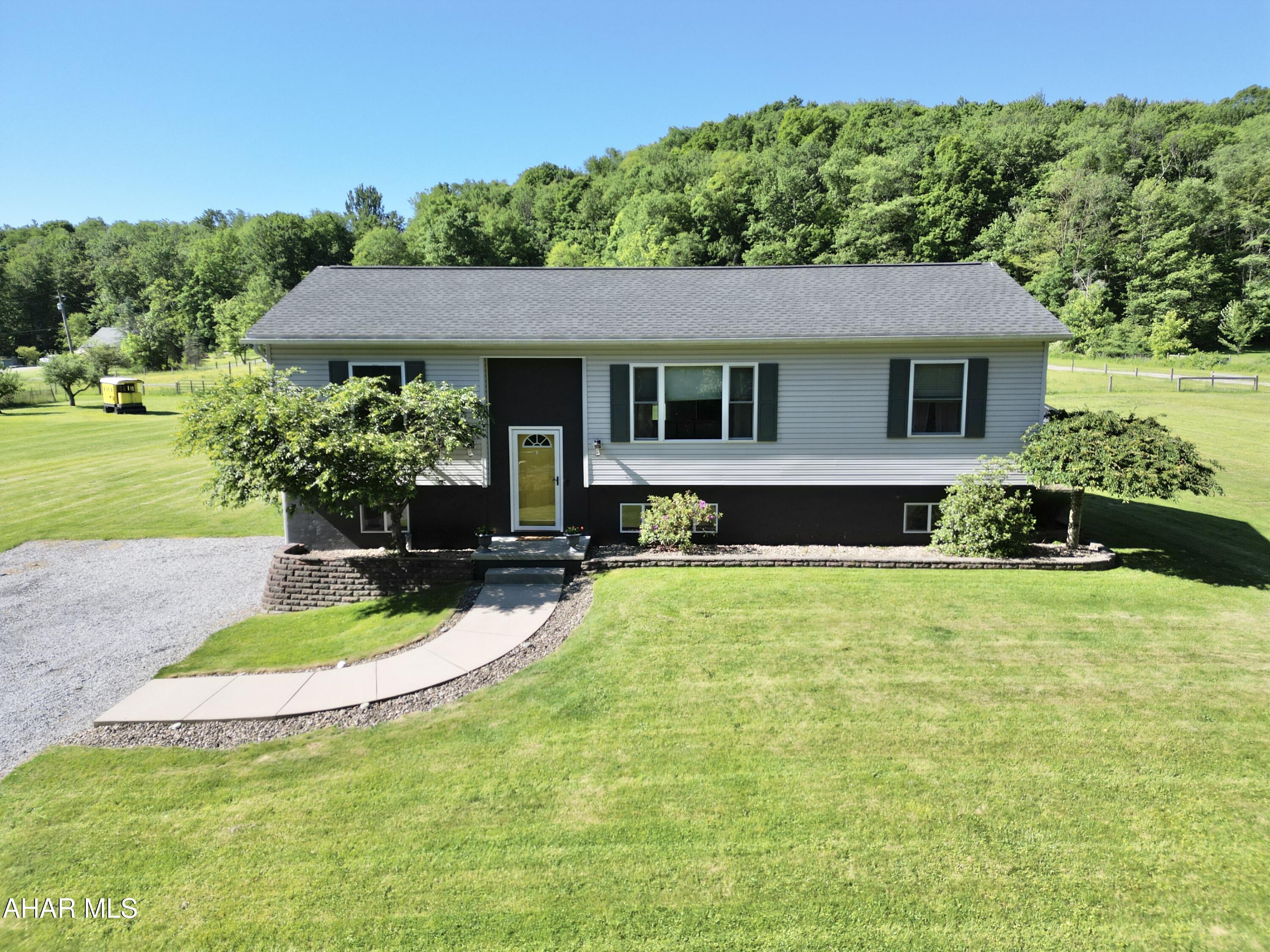 **ALL OFFERS WILL BE PRESENTED ON THURSDAY AT 7:00PM.**
You might want to pinch yourself because this one is real!
Situated on half an acre of flat land in the Bellwood-Antis school district, we are about to show you a home with extreme functionality and delightful pleasures.
Let's start with the important details.  There are 3 bedrooms and two full bathrooms on the main floor.  The primary suite is situated on the opposite end of the home, away from the additional bedrooms granting you the privacy and quiet you deserve after a long day.  It is complete with a full primary ensuite, too.
The kitchen area flows effortlessly and allows for complete functionality while entertaining, organizing your days on the chalkboard calendar wall, or a quiet evening in cooking your favorite meal.
The laundry has also been located to the main floor because every minute counts on those busy days and nights heading into the summertime.
Downstairs, an incredible mud room is going to help contain the chaos that life throws your way and keep you organized.  
The oversized finished family room in the basement is your ticket to space and more space.  One side is perfect for games or even office space while the other side can be set up with your gigantic sectional and oversized TV to watch your favorite movies or sports team.
Outside, there is no lack of greatness either.  The back yard patio is as sweet and inviting as they come.  Perfect for your morning coffee or your evening summertime cookouts.
This home is one of the sweetest and it is just waiting for you.
Call your agent today and schedule your private tour.