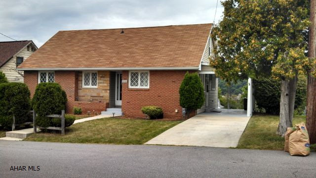 This 1.5 story home is in move-in condition.  The covered patio can also be used as a carport.  In addition to the full bath on the first floor and the 1/2 bath on the second floor, there is a large shower in the basement.  There are 7 new windows, a concrete driveway and walkway (3 years old), new carpeting in the living/dining area and hallway, new flooring in main bath, and a new 36 inch five-burner (with grill) gas range.  Carpeting on the second floor is only two years old.  The basement has lots of natural light and a walk-out to the backyard.  Located in the Hillcrest division of the Hollidaysburg Borough.  Priced to sell!