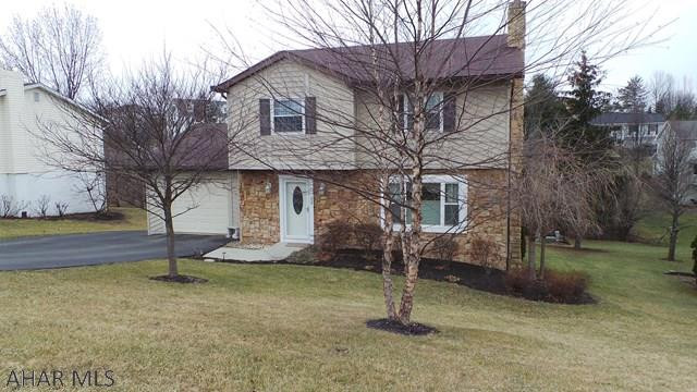 Nice and well maintained 4 bedroom home with 1 car attached and 1 car integral garage. New top of the line laminate flooring in kitchen and 1/2 bath, Feb. 2017. Covered deck and covered patio for your enjoyment.  Large family room with fireplace in basement. Radon was tested in January, 2017 and results were good,results located in documents. Kitchen includes appliances, bench and chairs that go with a built in table and counter. House is bigger than it looks. Room sizes are good.  Call the listing agent for more details.