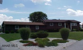 Beautiful 4 BR 2 BA home w/ new oak kitchen, sunroom.  Nice corner lot.  4+ car heated garage, newer roof, fenced yard, newer c/a unit.  J-892 Beautiful 4 BR 2 BA home w/ new oak kitchen, sunroom.  Nice corner lot.  4+ car heated garage, newer roof, fenced yard, newer c/a unit.  J-892