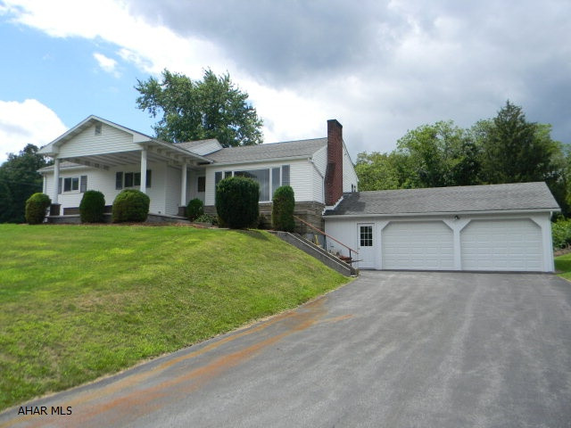 Nice well maintained rancher. The first level of this home offers 3-beds/1-Bath, LR w/Wd Burning FP, Kit w/Eat-in area and built-ins and a DR. Lower level is finished with additional Full Bath, Bed, Rec. Room & Fam. Room. Original hardwood floors remain under carpet in most rooms of the house.Oversized two-car attached garage, front and rear covered porches & outdoor pavilion w/electric. Oil hot water heat, mini-split heat pump with air conditioning, vinyl replacement windows & macadam driveway.
