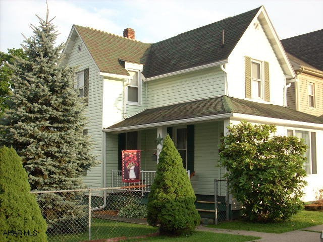 Beautiful Bellwood Borough home with fenced yard, above ground pool, 1 car garage, central air, and updated mechanics.