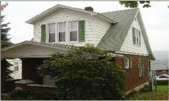 Great family home 3 bedrooms, 1st floor laundry, finished family room, Great view of city from deck newer furnace, newer roof,  Realtor related to seller