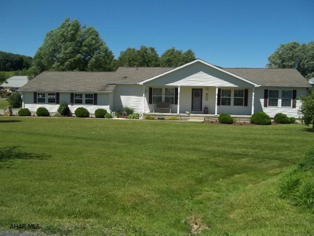 All you can say about this one is, WOW! You name it, this home has it. This amazing manufactured ranch style home  sits on 1 full acre of flat land with a screened in gazebo for outdoor fun. It has a large 3 car garage and a  composite wood deck with a retractable awning overlooking the open yard. The basement is completely finished with a gas fire place with lots of room for entertaining. This home is in mint condition and move in ready with a Central vac unit as well! Once you set your eyes on this one you will want to call it home! Call listing agent today and request showing.