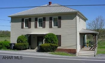 Two story house, now duplexed could be converted back to single family home. Two 2-BR, 1 BA units. One unit on eadh level. Owner pays sewer, trash, insurance and taxes. Two family house, now duplexed, could be converted back to single famly. Two 2-BR, 1 BA units. One unit on each level. Owner pays sewer, trash, insurance and taxes.